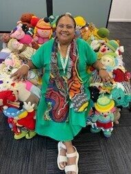 Aunty Kym in the ‘Acts for Kids’ soft toys lounge chair